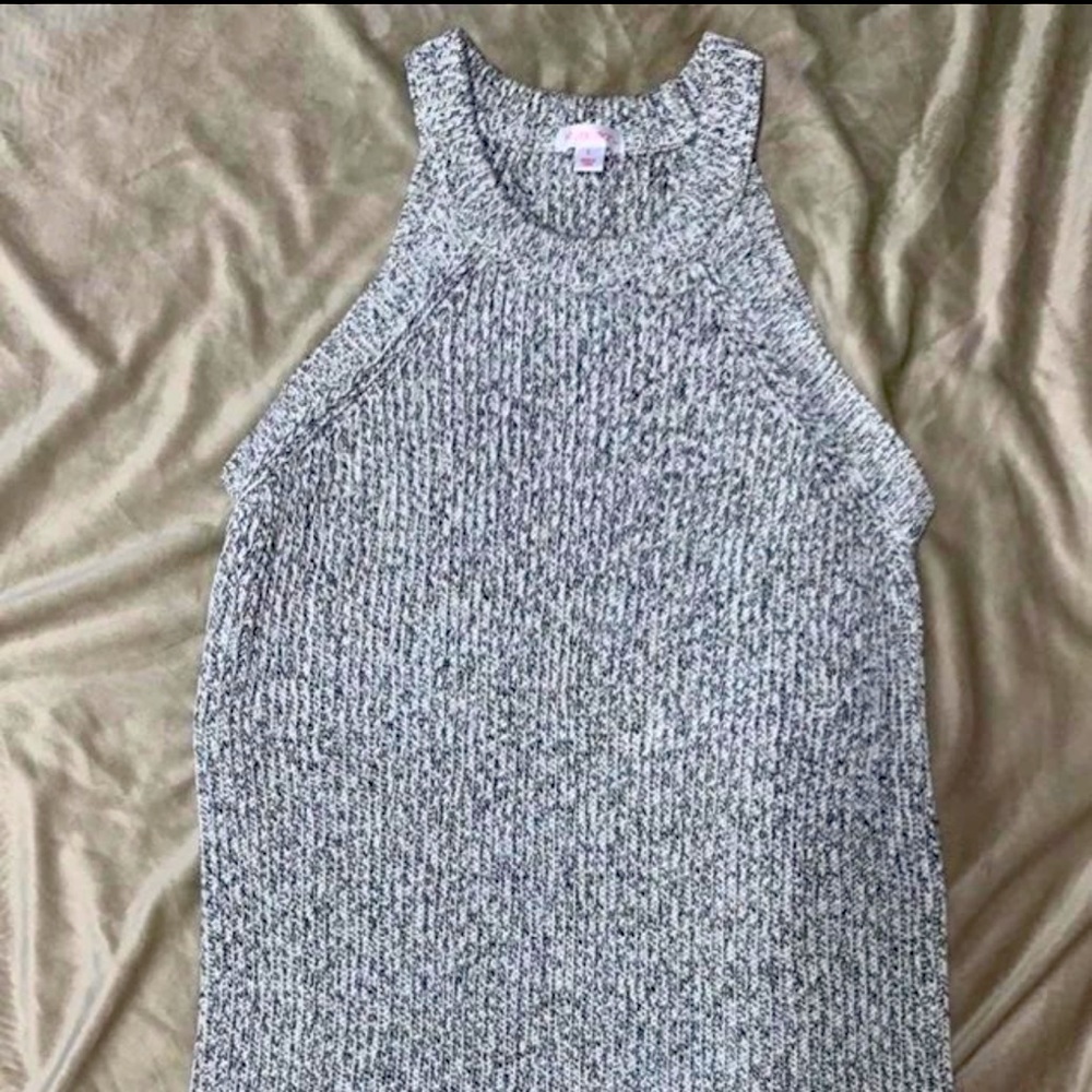 Women’s grey sweater dress, perfect for to pair with  booties.